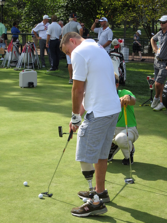 U.S. Marine Kevin Vaughan got some golf tips in the PGA’s Birdies for the Brave program.