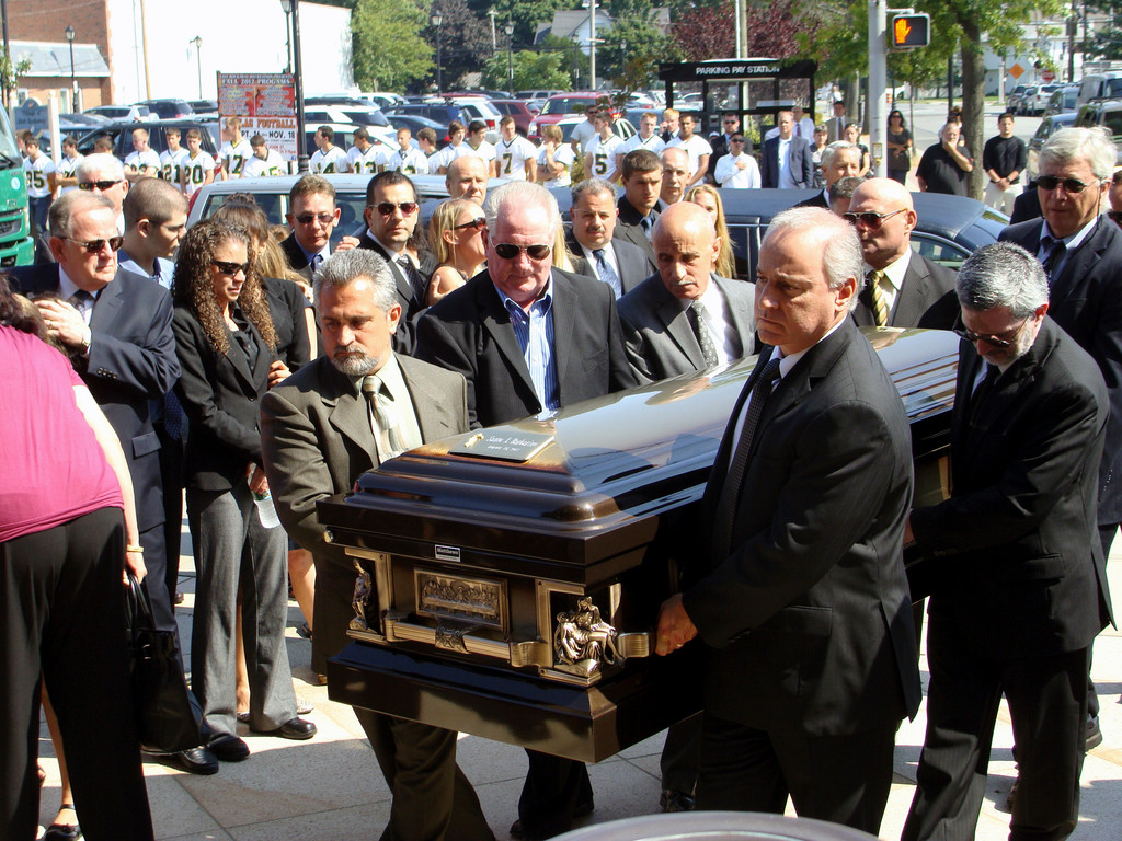 Pallbearers carried Santo Barbarino’s casket into the church.