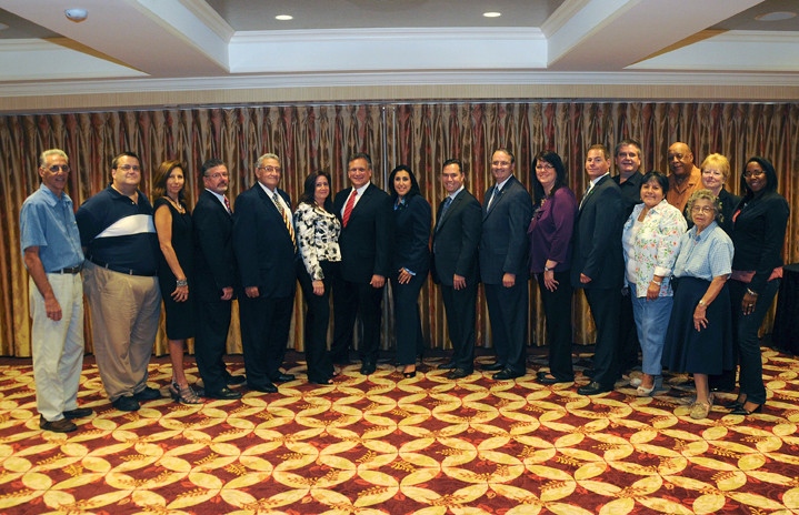 From left were Joe Franchino, MK Wellness Associates; Joe Reider, San Giorgio Florist and Garden Shop; Michele Cacioppo, Sir Speedy Printing; Pat Rogers, U.S. Limousine Service Ltd.; Joseph Pascarella, Director of Nassau County Veterans Service Agency; Nancy Lupo, Corporate Sales Manager, Viana Hotel and Spa; County Executive Edward P. Mangano; Carol Hasenstab, Vice President, TD Bank; Jerry Scotto, Westbury Manor; C. William Gaylor, III, Lynbrook Associate Village Justice; Lisa Chalker, Family Affair Distributing Inc.; Frank Frisone, TD Bank; William Moseley, Moseley Photography; Nancy Fernandez, Westbury-Carle Place Chamber of Commerce; Honorable William B. Wise, Village of Westbury Trustee; Victoria Laura, Westbury-Carle Place Chamber of Commerce; Eileen Baker, Vice President, TD Bank; Charlene Nolasco, owner, Chae Web Design.