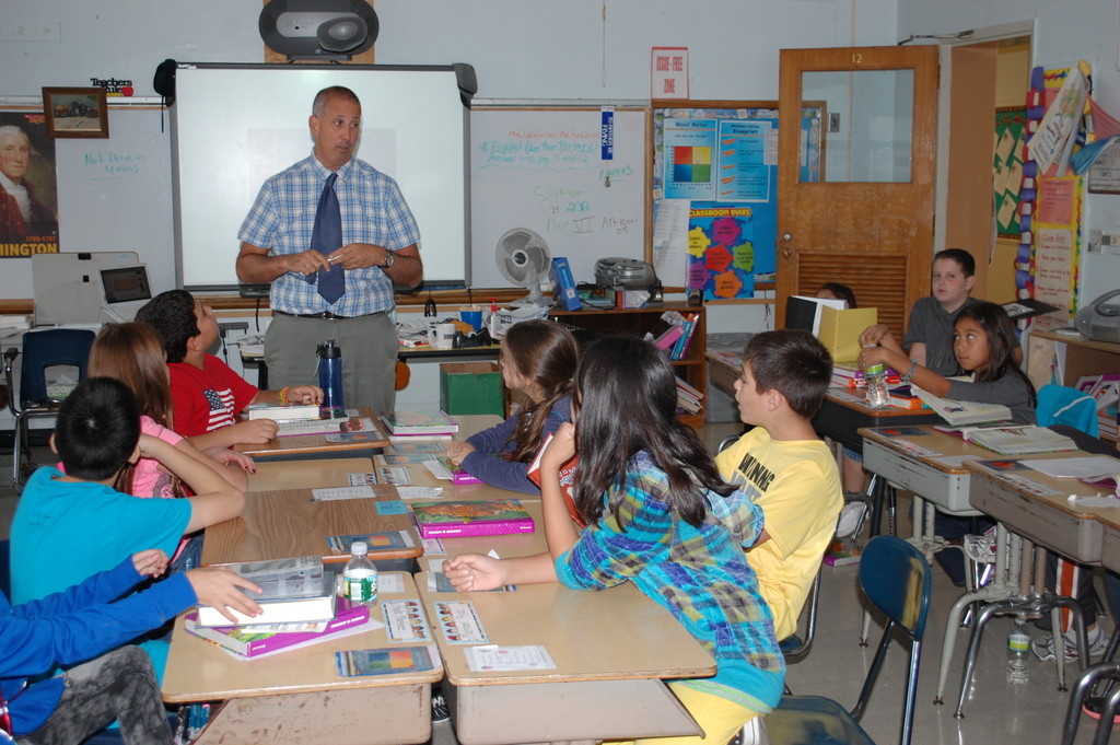 David LeWinter teaches his fifth-grade class at the William L. Buck School in District 24, one of two Valley Stream districts to have its teacher evaluation plan approved by the state.