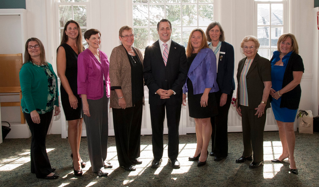 Assemblyman brian Curran, center, honored, from left, Julie Bergin, Cathy Dapolito, Marylin Devlin, Joan Flatley,Theresa Gaffney, Patricia Hickey, Audrey Morrow and Gail Schwarting.