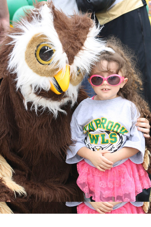 Ashley Stimac, 3, with the Lynbrook Owl during the game.