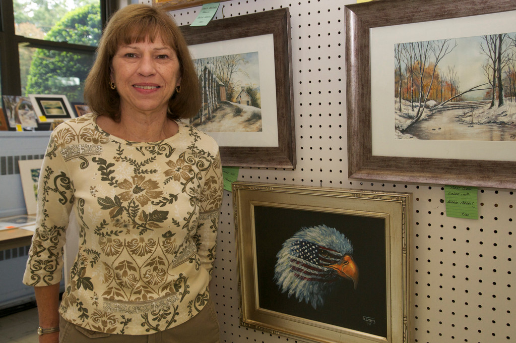 Inspired by september 11 events, Bobbie Forgacz, of Long Beach, stood proudly next to  her work.