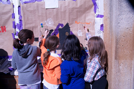 Brook Farrell, Sierra Levine, Daniella Moy and Victoria Parisette painted a spooky house on their window.