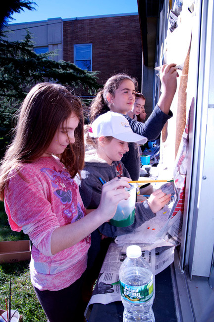 Leslye Blau, Ava Kayla Carlins and Ella Avshalomov worked together to decorate their window.