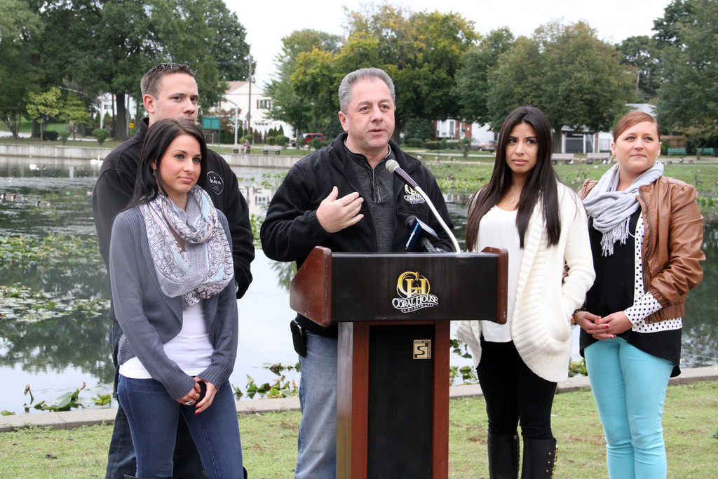 Butch Yamali,  at lectern, owner of the Coral House, appeared with staffers Brittany Musto, far left, Adam Panetta, Jill Ibarra and Jennifer Rickert to allay fears about 
alligators at the 
catering hall.