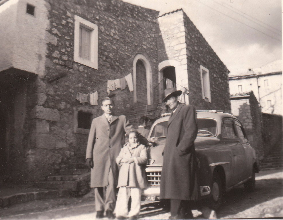 In 1955: Pictured with their Fiat were Arseno Baccari, Miss Mila Fabrizio, and Loreto Baccari in the town of San Donato Italy 
The Fiat 500 is now sold in the US.