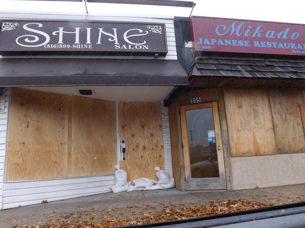 Some shops on Merrick Road in Lynbrook were boarded up in preparation for Hurricane Sandy.