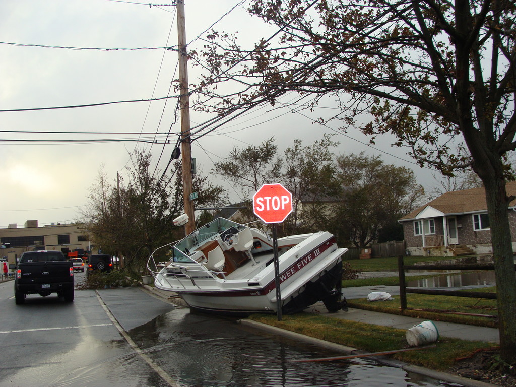 A boat floated down the street to eventually rest in front of a Fifth Avenue home in Bay Park.