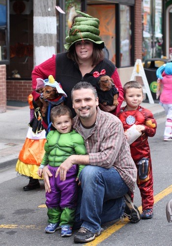 The Lonso family: Michael and Kathy, with their children Michael, 4, at right, and Matthew, 2, along with with their puppies Frankie and Chanel at Lynbrook’s festivities.