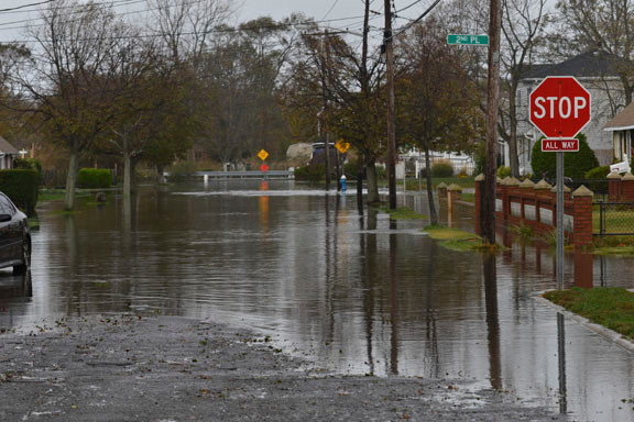 A plume of raw sewage escaped from a pipe on Barnes Avenue, west of 3rd Place, for several days following Sandy. Residents worry their homes may contain health hazards.