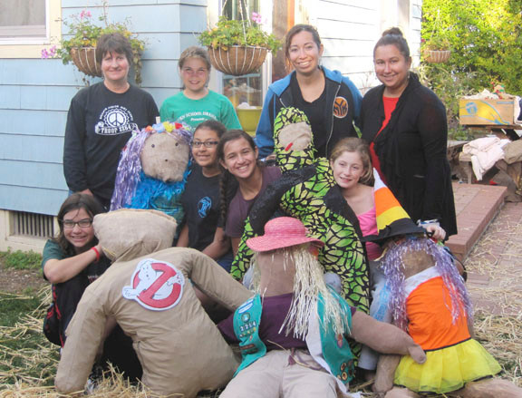 these Scarecrows stuffers, clockwise from top left, are Nancy Houser, Grace Houser, Maria Fernandez, Paula Reyna, Shannon Dempsey, Alia Reyna, Jaida Fernandez and Emma Waney.