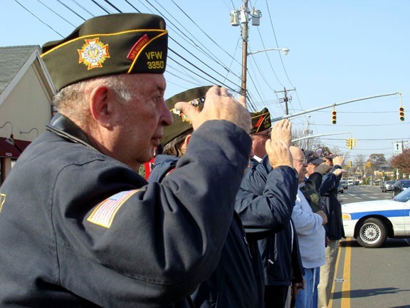 VFW member and Korean War veteran Joel Blaustein saluted the flag.
