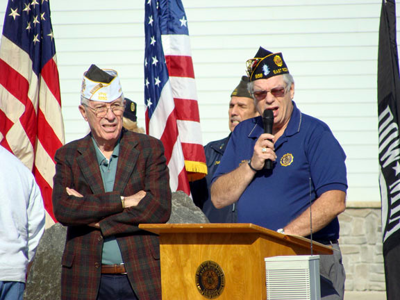 Veteran commanders Joe McCarthy, left, of the VFW, and Shelly Conn, right, of the American Legion, spoke to the crowd.