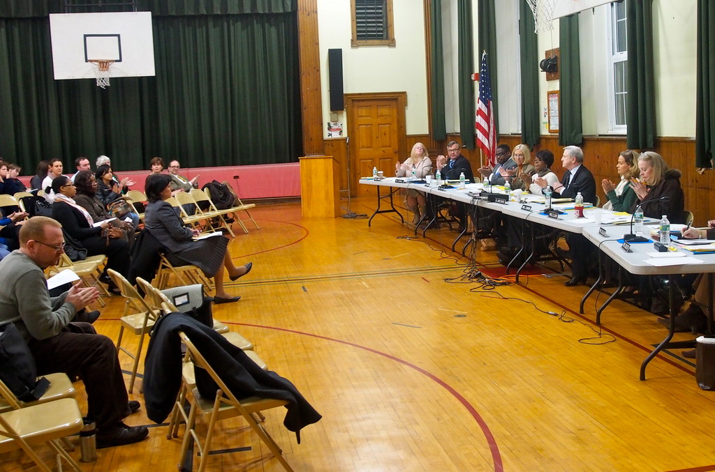A round of applause accompanied the passage of a motion to allow the East Rockaway school district to lease Baldwin’s unused school buildings.