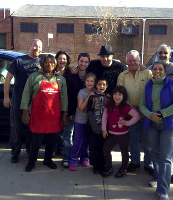 Volunteers who help Nick Paxinox with his Thanksgiving Tradition of feeding holiday meals to those in need.
