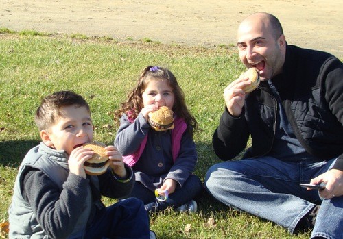 Anthony, 5, Vanessa, 3 and Dan Landolphi of East Rockaway, enjoyed some hot, juicy burgers.