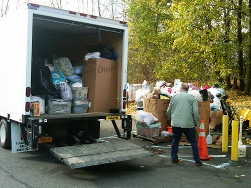 The truck bound for East Rockaway being loaded in Albany by Ted and Becky Hans.