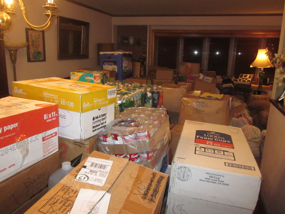 Dozens of boxes in the Ingers’ East Meadow home last Friday.