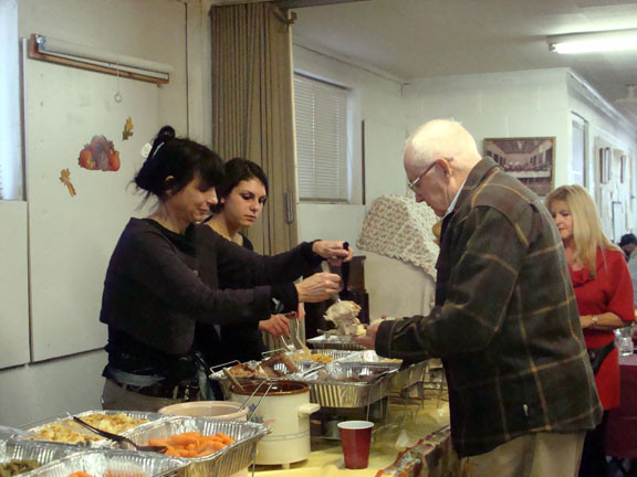 Volunteers served a hot turkey dinner with all the trimmings.