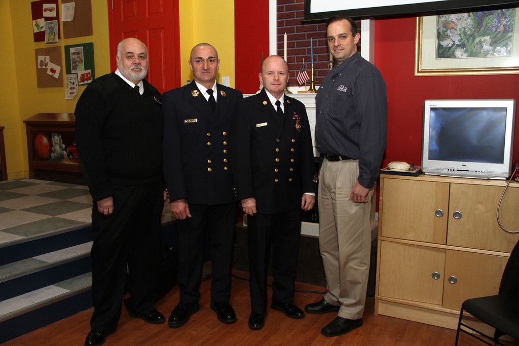 Sue Grieco/Herald
Lynbrook and South Hempstead  were two recipients of a regional grant. Pictured are Thomas Devaney with Commissionor Donald Spatz of South Hempstead FD, and Commissioner Pasquale Rayano of Lakeview FD with Chief Edward Hynes of the Lynbrook Fire Department.