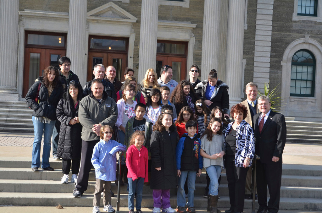 The talented artists stood on the steps at the Nassau County Legislature.