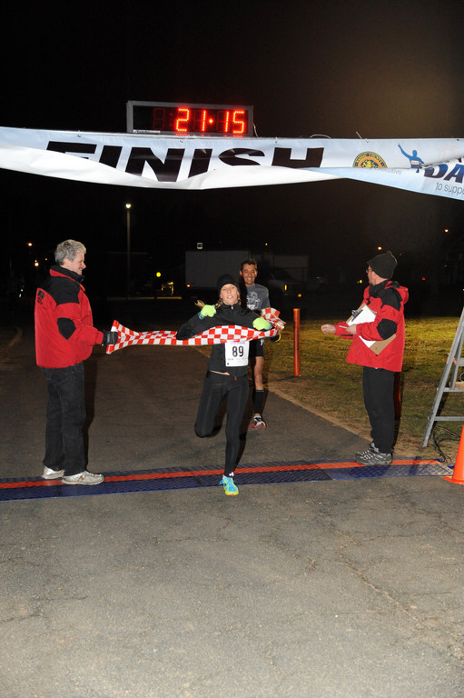 Donovan Berthoud/Herald
Now, where’s the champagne?
Jeanette Hall, of West Babylon, was the winner of the First Annual New Year’s Eve 5K Dash at Eisenhower Park, which commenced as the clock struck midnight on New Year’s Eve.