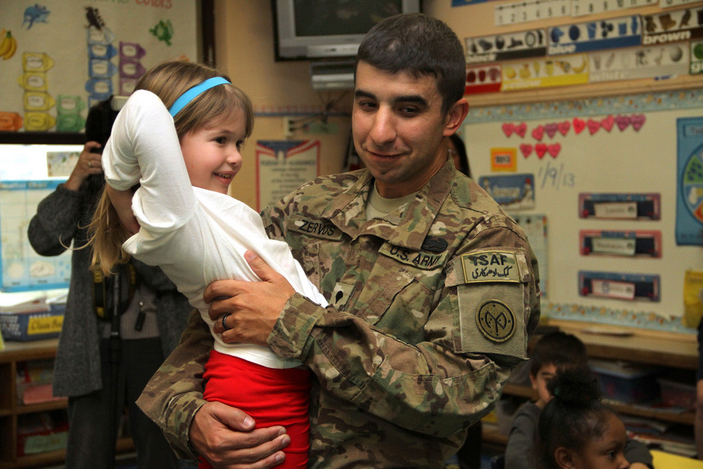 SPC. Michael zervos returned from a tour of duty in Afghanistan and surprised his 5-year-old daughter, Danielle, in her kindergarten class at the Robert W. Carbonaro School on Jan. 9.