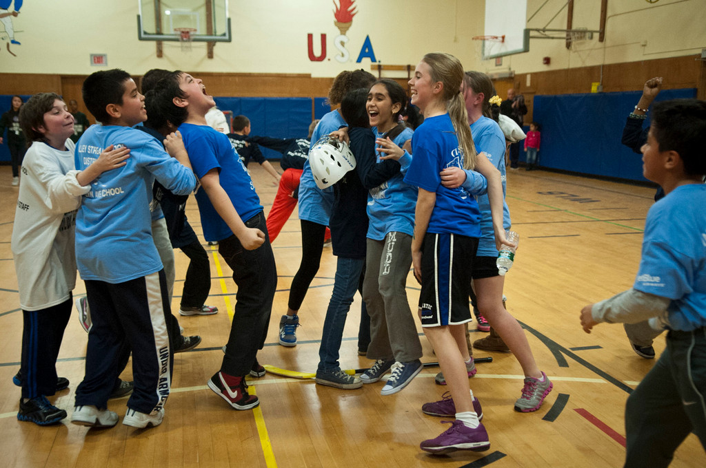 Students from the Brooklyn Avenue School celebrated after they won the District 24 floor hockey tournament on Jan. 15.