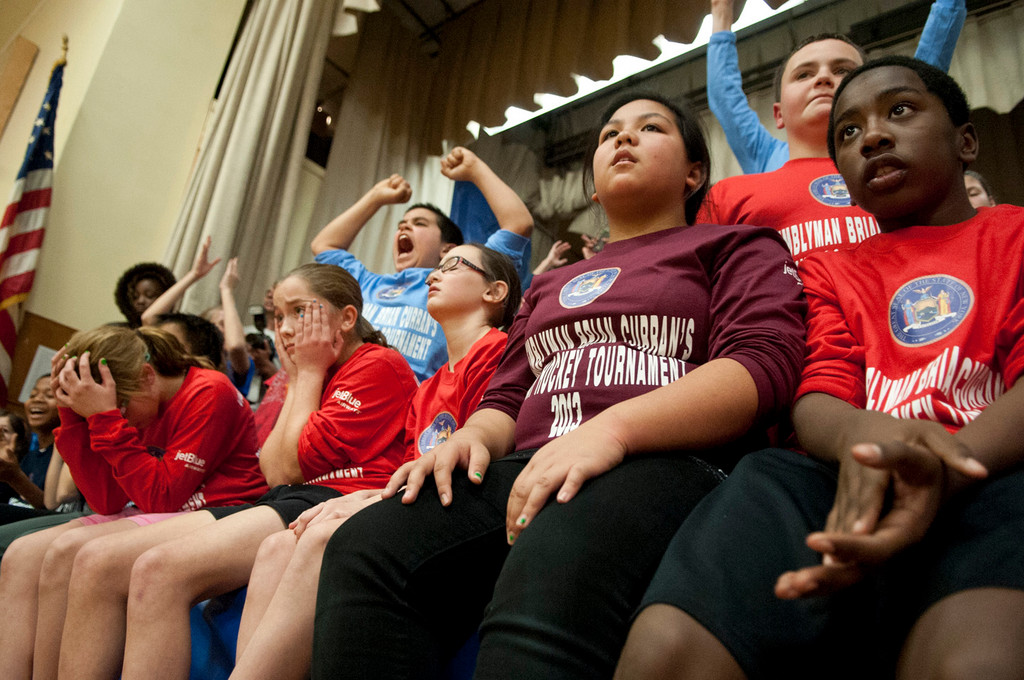 District 24 students reacted either with cheers or sighs as teams from their respective schools faced off.