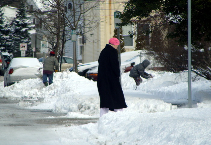 Residents work, walk and play in the snow