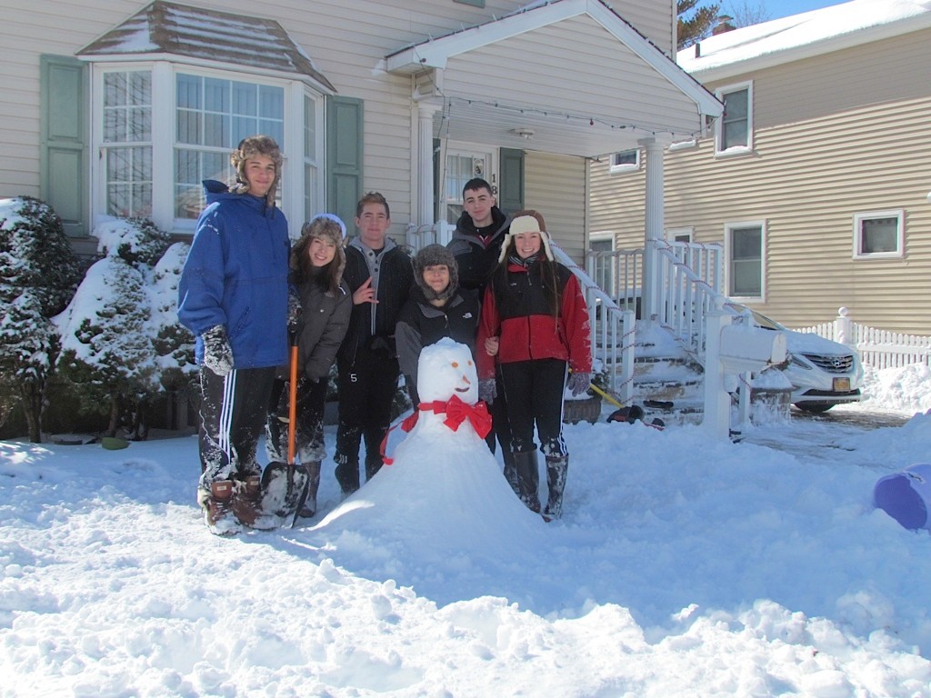 The Freire family built a snowman outside their New York Avenue home in Valley Stream on Saturday.