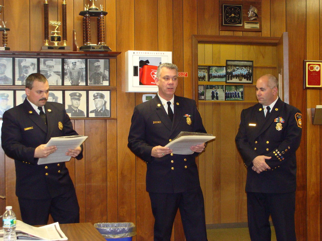 Chiefs Tom Johnson, left, James Henshaw and Steve Torborg presented each of the Lynbrook Fire departments with awards.