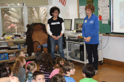 North Shore Animal League representatives Jayne Vitale, left, and Lauraine Merlini spoke to students at Lynbrook’s Waverly Park School about the plight of homeless pets in the wake of Superstorm Sandy.