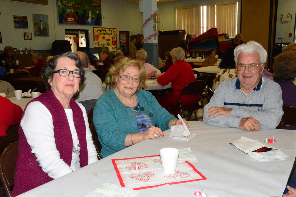 Friends Phyliss Bouchard, Anna Zajac and Joseph Guerrera socialized at the Greis Park Senior Center for the Valentine’s Day luncheon.