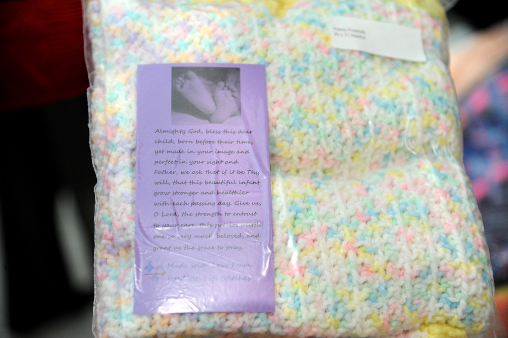 Blankets for premature infants included a prayer card.