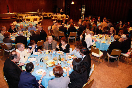 The attendees enjoy a wonderful dinner before the service.