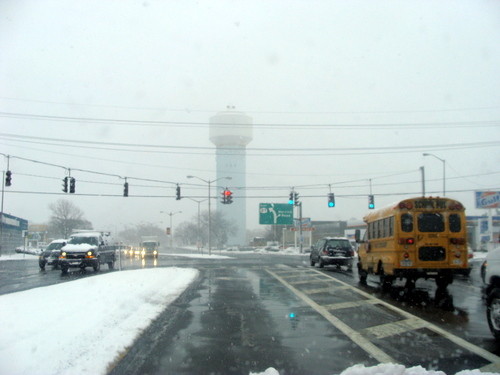 Traffic was slow this morning as commuters drove through slushy roadways. The photo was taken on Sunrise Highway in Lynbrook, looking east.