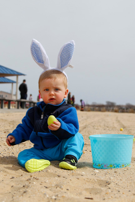 It was 10-month old Tommy O’Hagan’s first Easter egg hunt, and his introduction to sand last Saturday when he and his family took part in the annual Hewlett Point Easter Egg Hunt in Bay Park