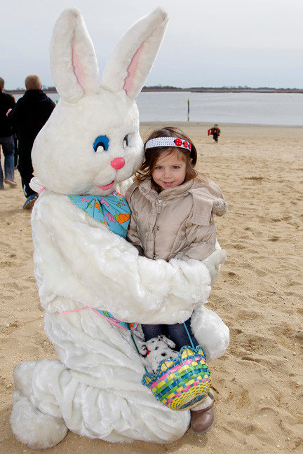 FOur-year-old Emma Cooney, from East Rockaway, met the Easter bunny after the egg hunt.