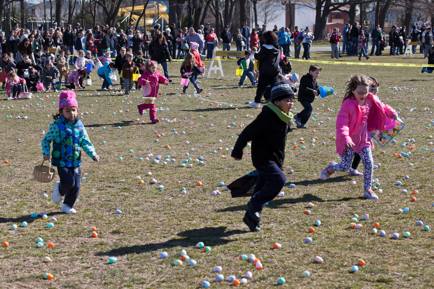 Children raced to collect the most eggs in Greis Park.