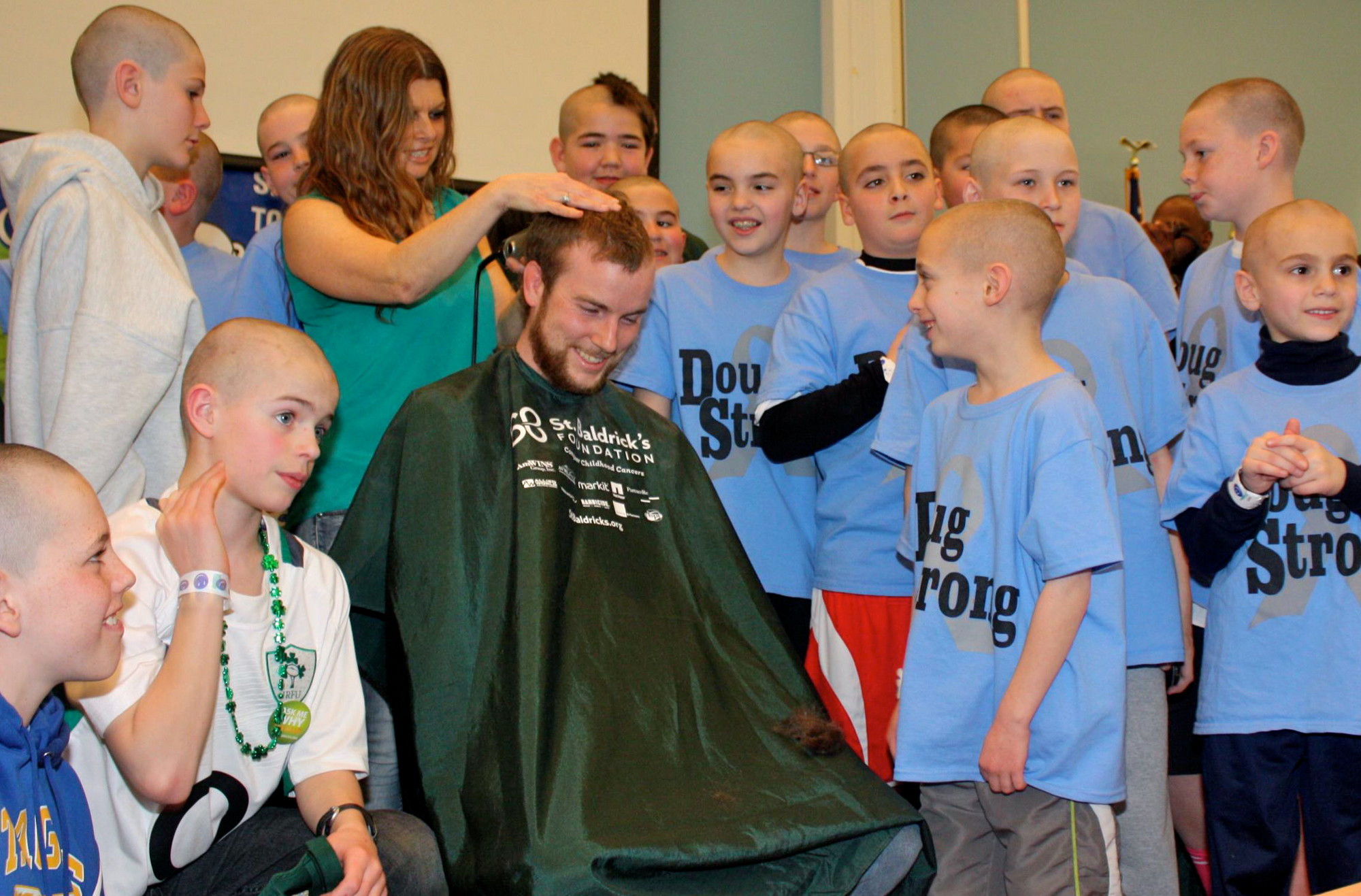 Friends and family of Doug Gonzalez had their heads shaved at the St. Baldrick's Foundation event last month in Rockville Centre. The group raised more that $21,000 for cancer research in Doug's name.