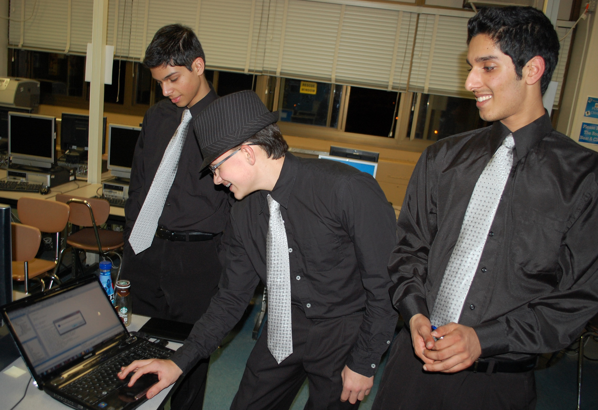 Computer Science students, from left, Michael Sanky, Ralph Garcia and Kenji Japra, all from North High School, showed the games they made by writing code.