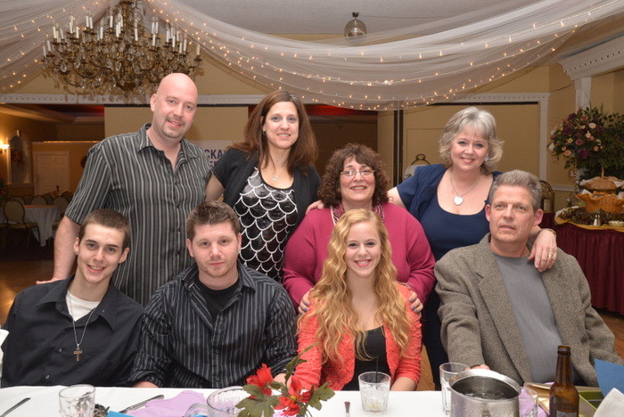 Mary Malloy, top right, with family members: back row: Son Keith and daughter-in-law Desiree: friend,Linda; seated from left were her son Paul Valgoi, Chris Luzon, daughter Brianne Valgoi, and husband Mike Malloy
