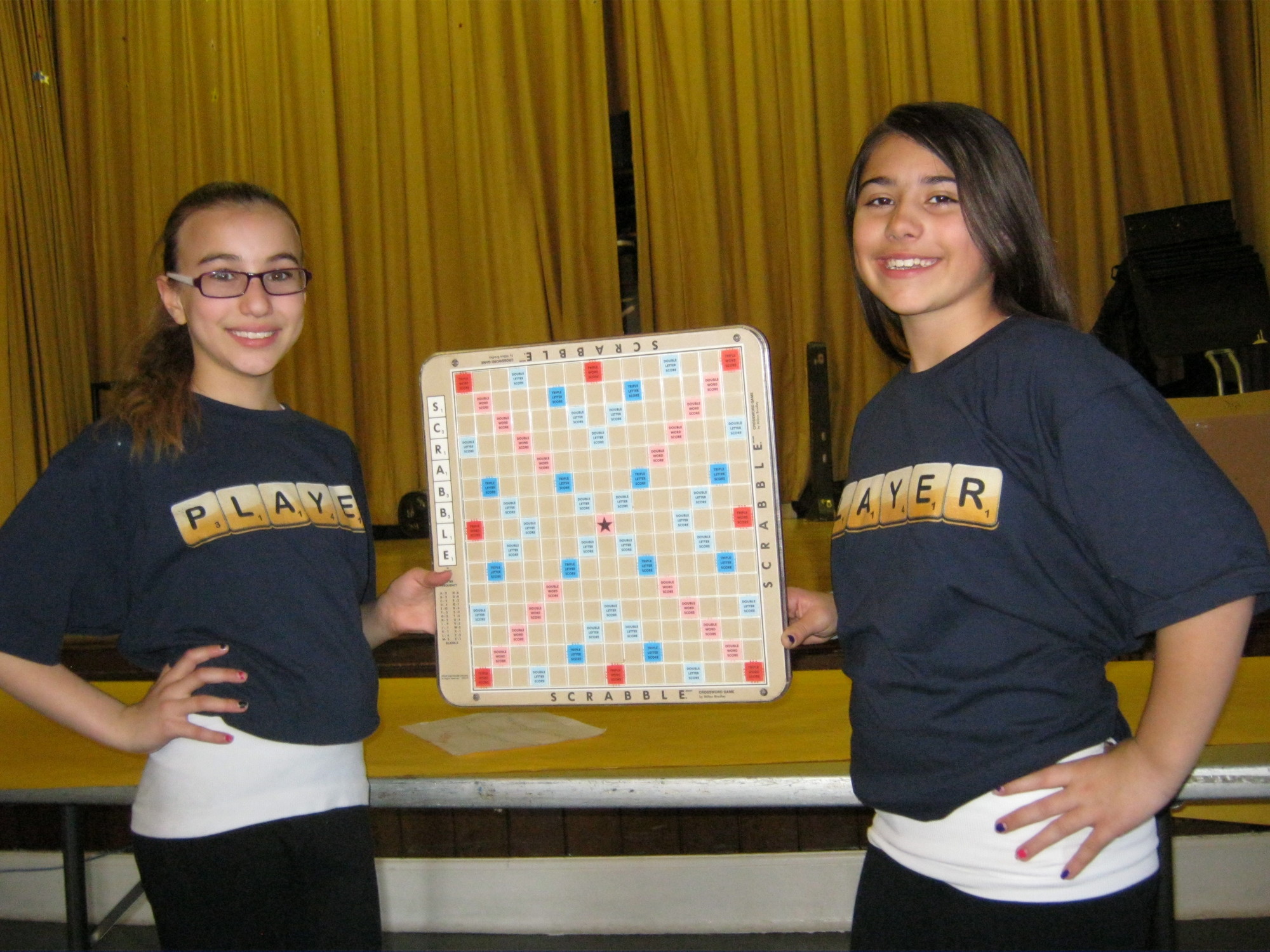 Caroline Curti, left, and Lydia Gaccione celebrate a well-worded victory.