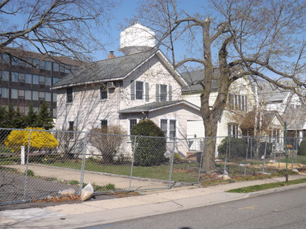 9 Merton Ave.:
Three properties — 417 Ocean Ave., 3 Merton Ave. and 9 Merton Ave. — are still standing after they were proposed to be rezoned, demolished and turned into a parking lot.