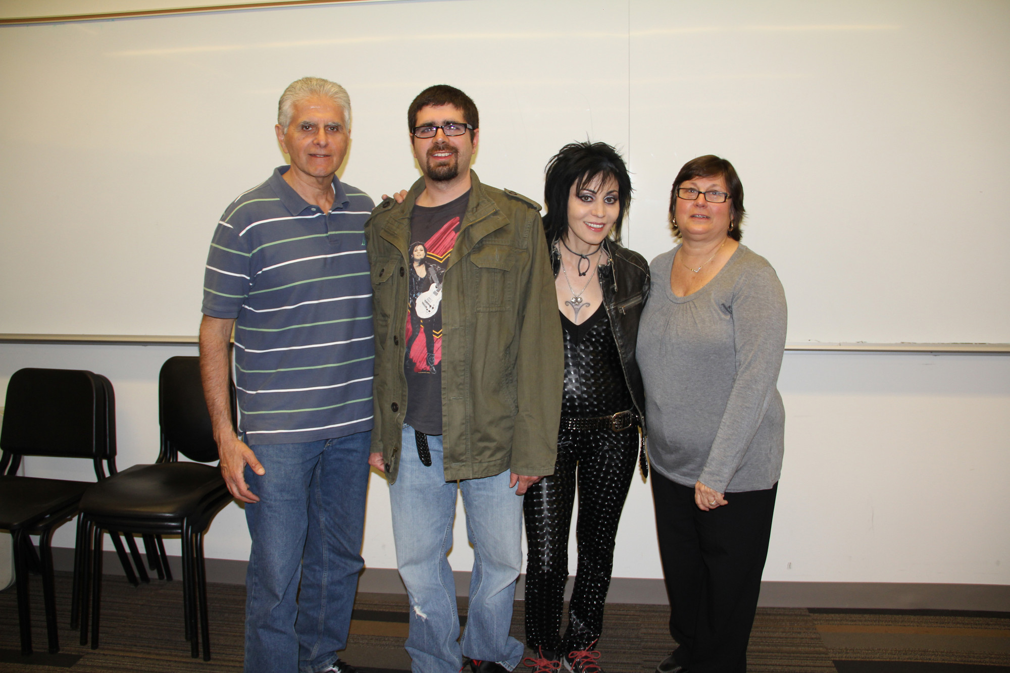 Angelo Maroulis, with his son Angelo and wife Cathy, met with Joan Jett before her concert at Molloy College’s Madison Theatre.