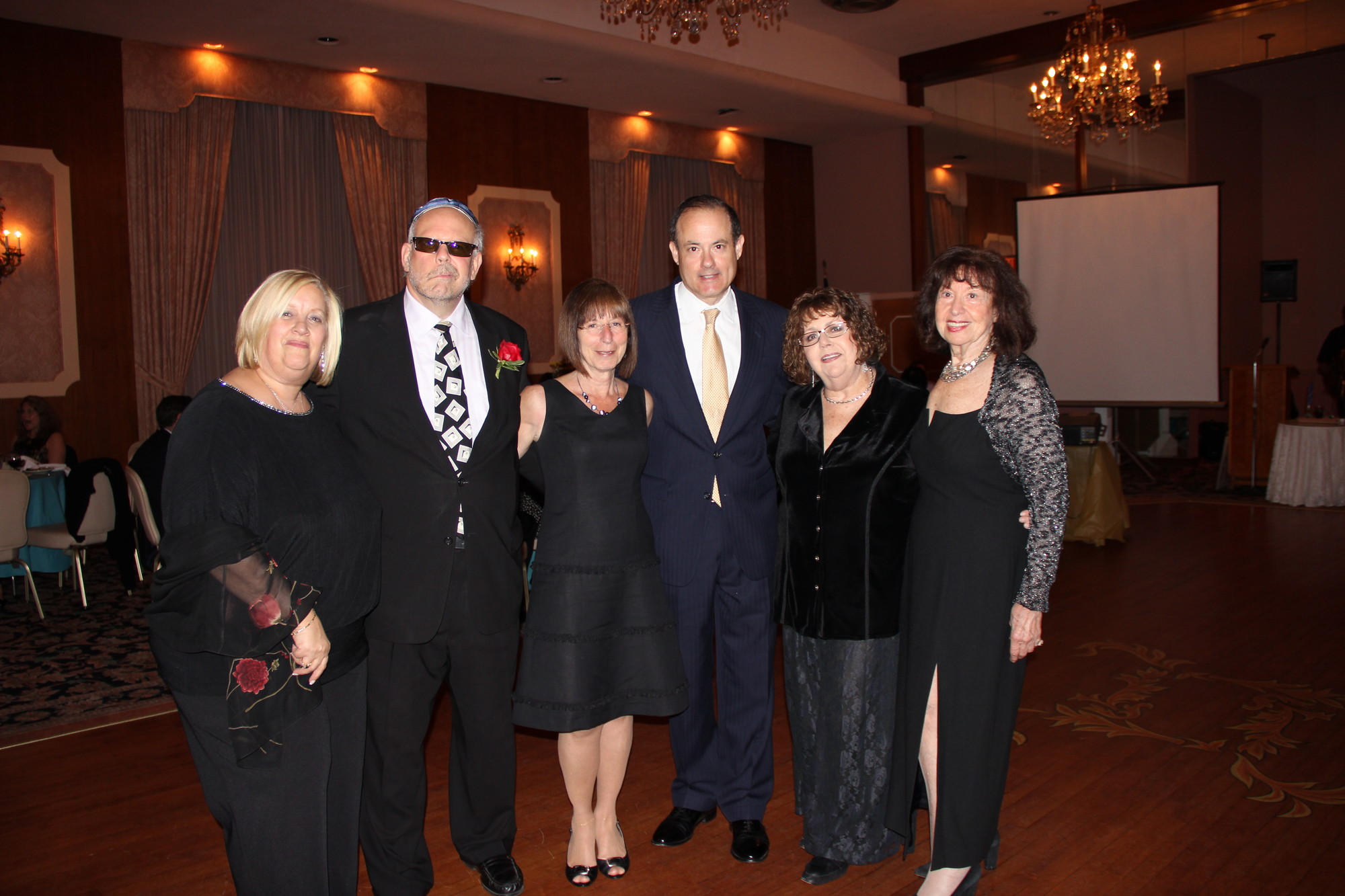 Meri Masin, left, Rabbi Marc Gruber, Renee Gruber, David Nemschuff, Gail Zerfuss, and co-chair of the fundraising committee Nina Roll.