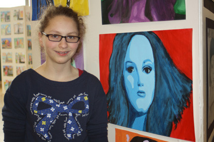 Eighth grader Sommer Schneller debuted her celebrity portrait of Adele in the Lynbrook South Middle School art show.
