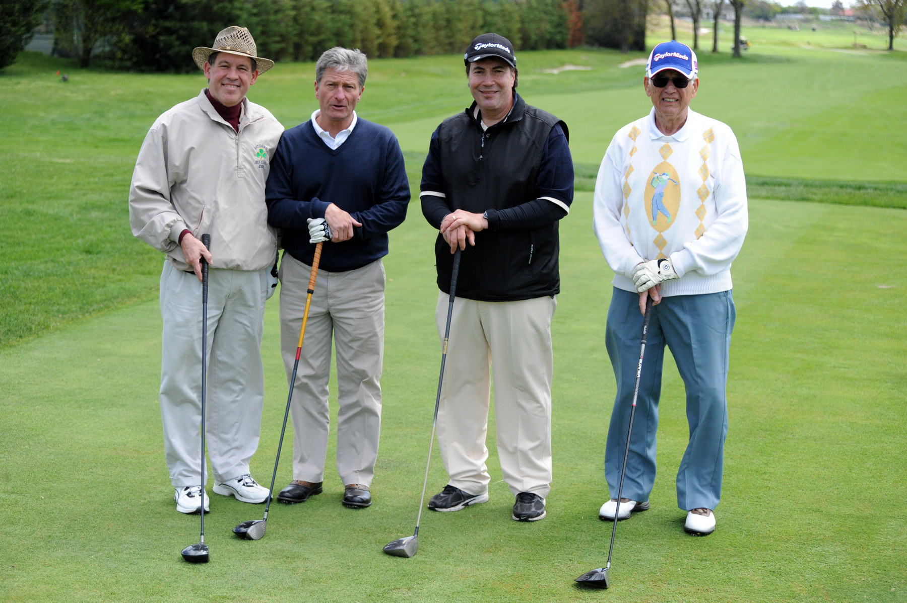 Francis Becker, Jr., Dennis Farrell, John Giordano, Phil Giordano enjoyed a round of golf.
